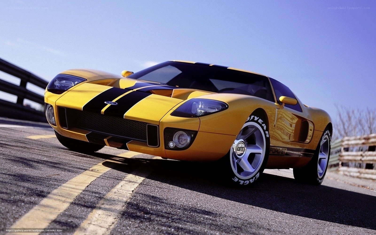 Yellow Ford GT on racetrack