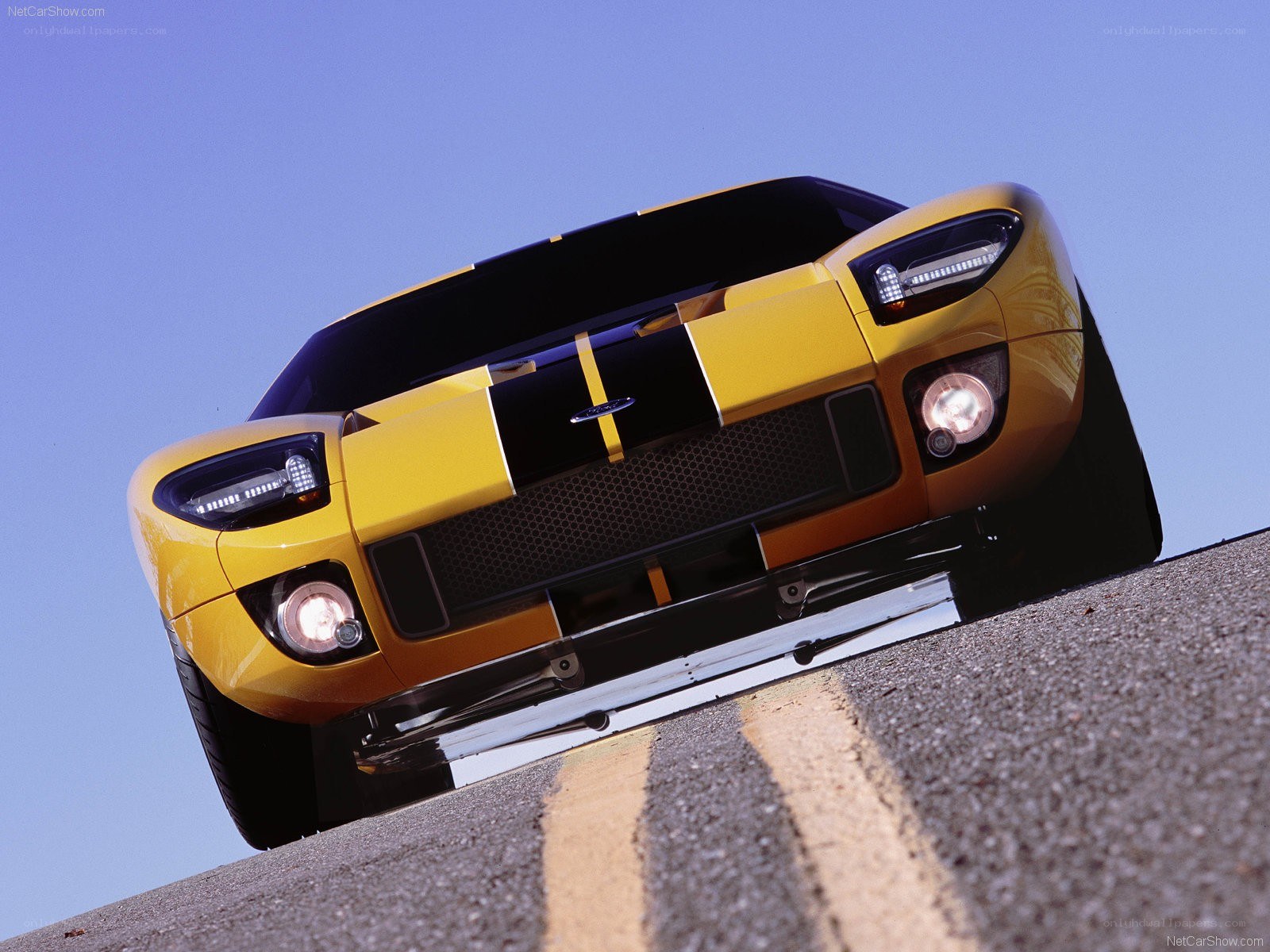 yellow ford gt on road