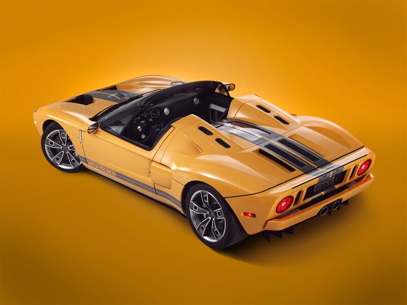 Yellow Ford GT-XI sports car