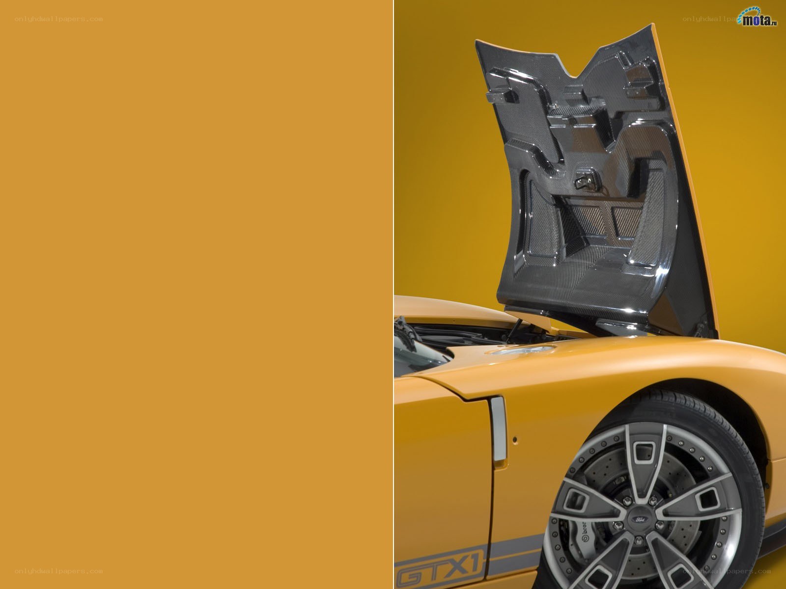 Yellow Ford GTX1 with open hood