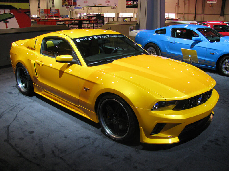 Yellow Ford Mustang at auto show