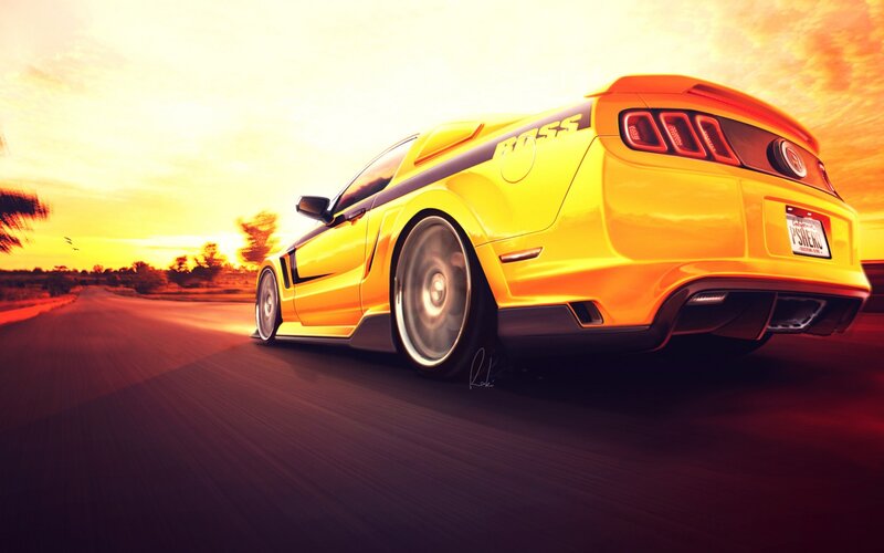 Yellow Ford Mustang at sunset