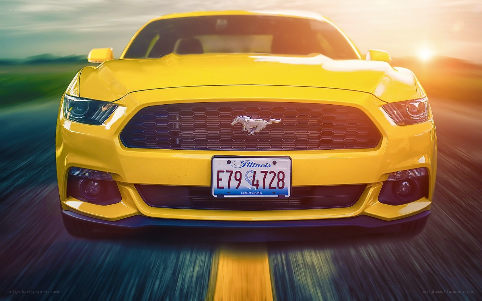 Yellow Ford Mustang in motion