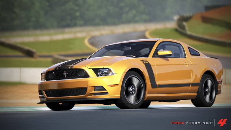 yellow ford mustang on racetrack