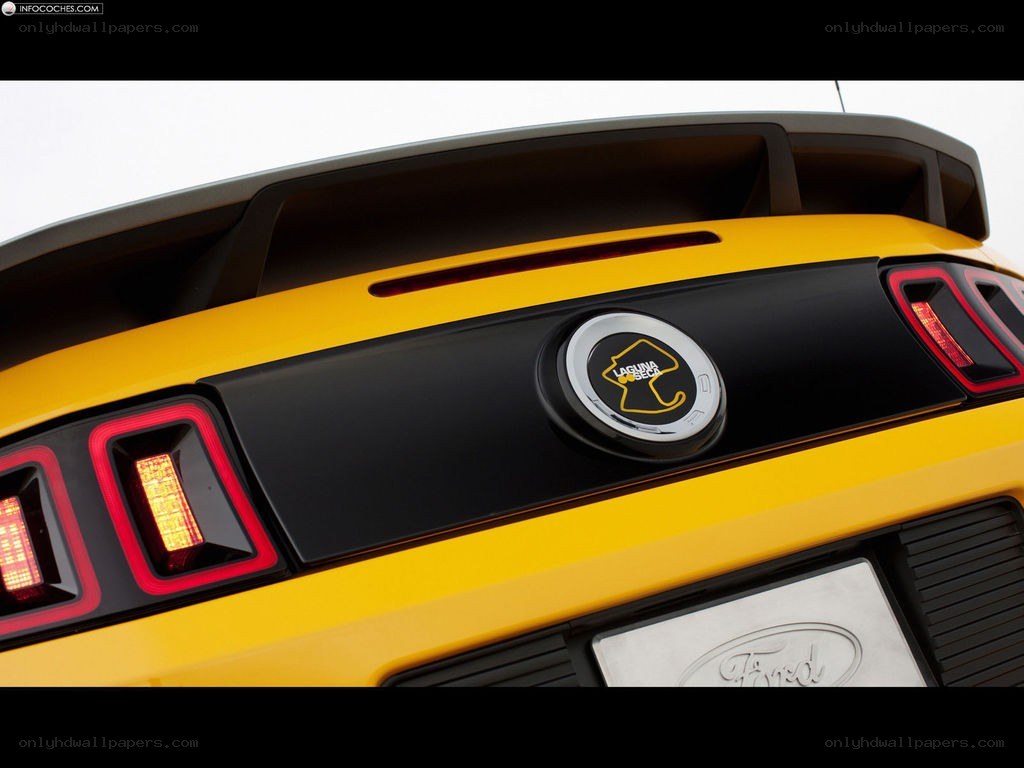 yellow ford mustang rear view