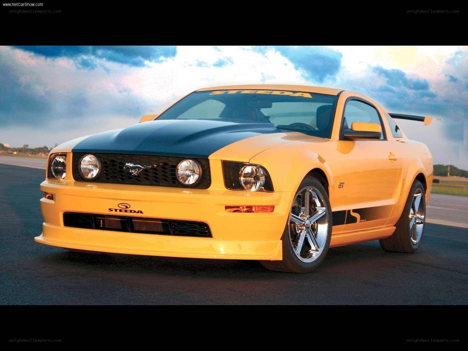 Yellow Ford Mustang with Steeda modifications