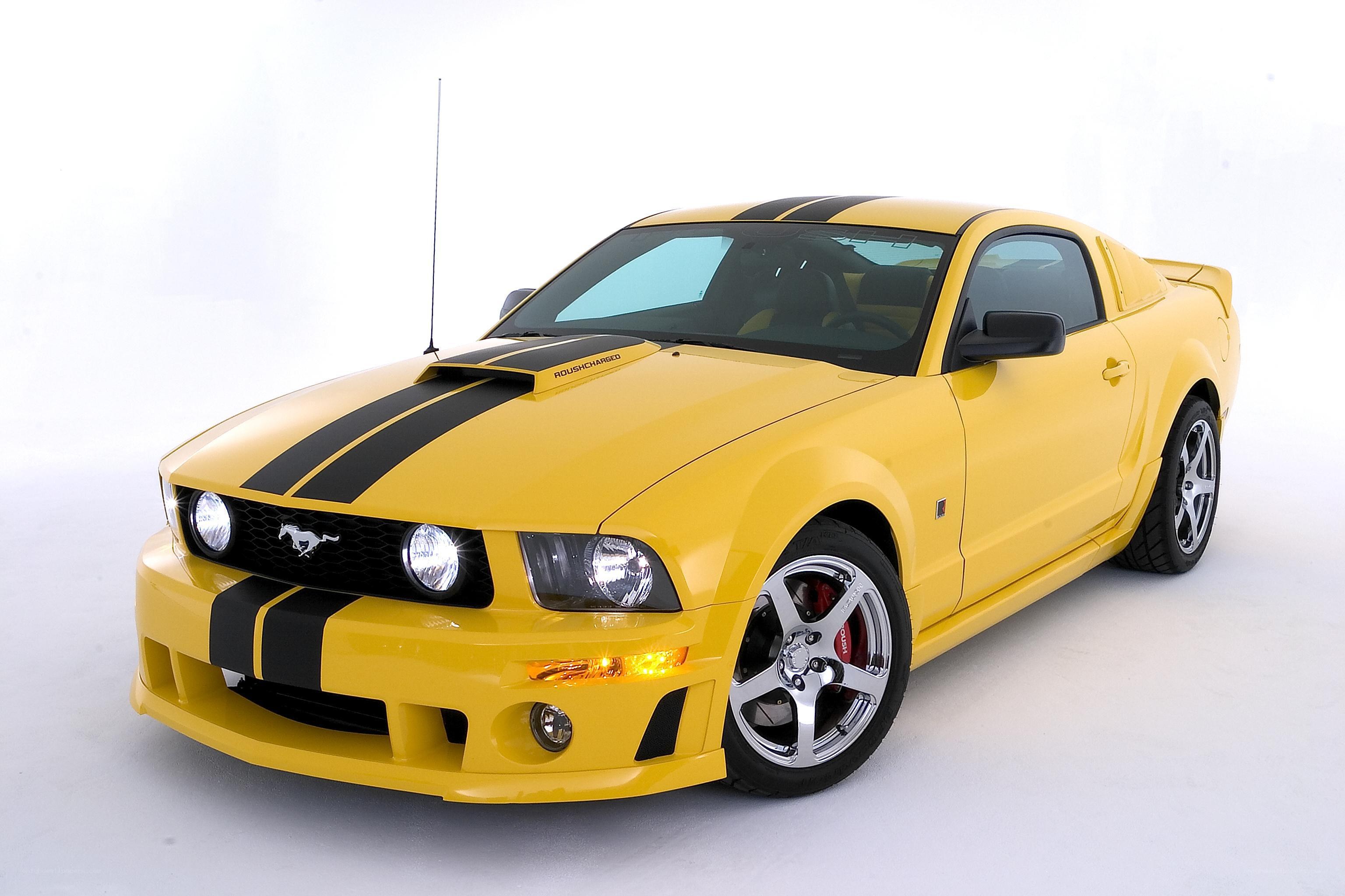 Yellow Ford Mustang with stripes