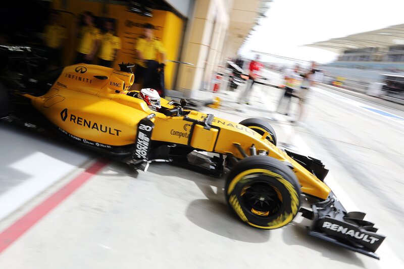 Yellow Formula One Car — Dynamic, Afternoon, Photograph, Driver, Pit Crew