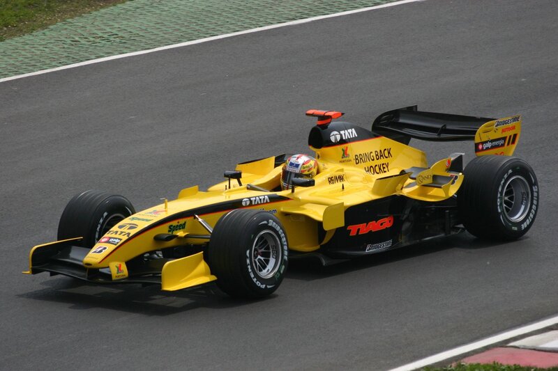 Yellow Formula One Car — Dynamic, Afternoon
