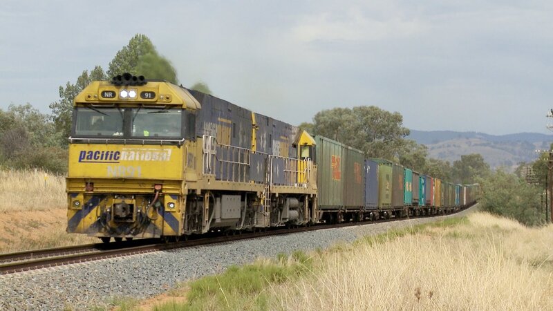 Yellow Freight Train — Calm, Afternoon, Photograph