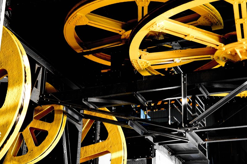 yellow gears in industrial machinery