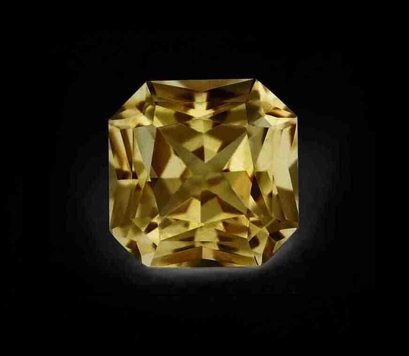 yellow gemstone on black background