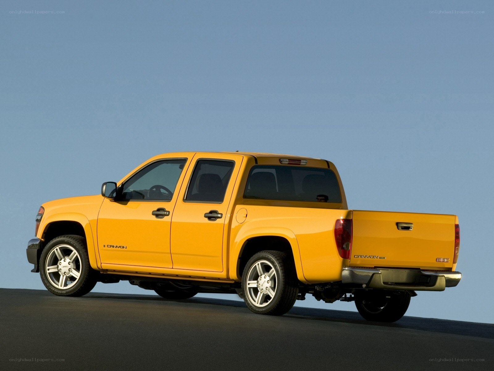 Yellow GMC Canyon pickup truck