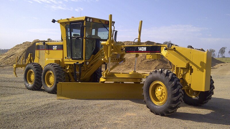 Yellow Grader Machine