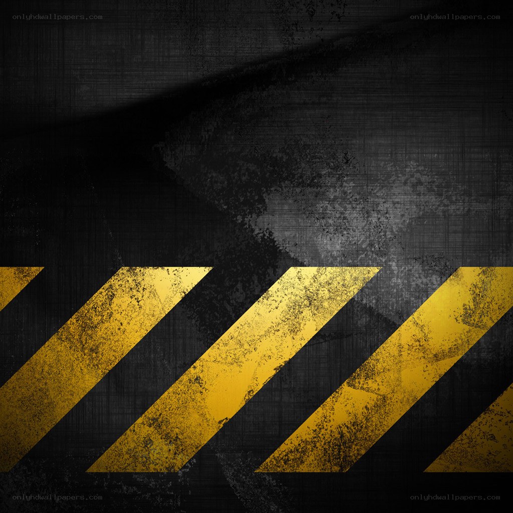 yellow hazard stripes on dark background