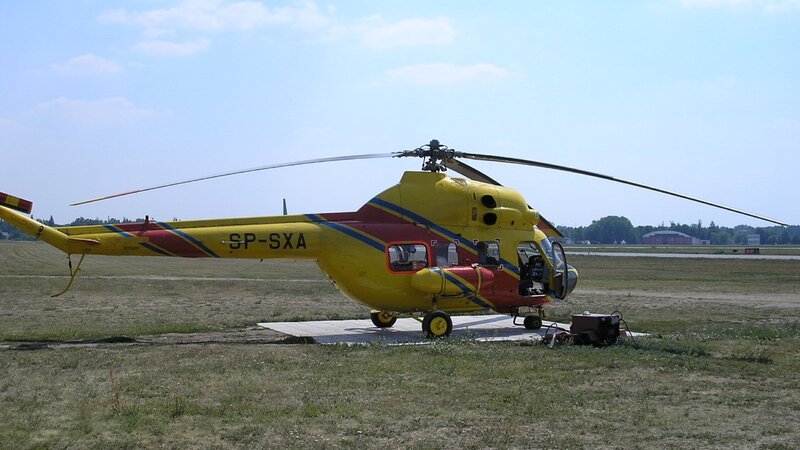 Yellow Helicopter on Field