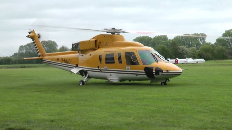Yellow Helicopter on Grass