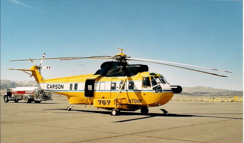 Yellow Helicopter on Tarmac — Calm