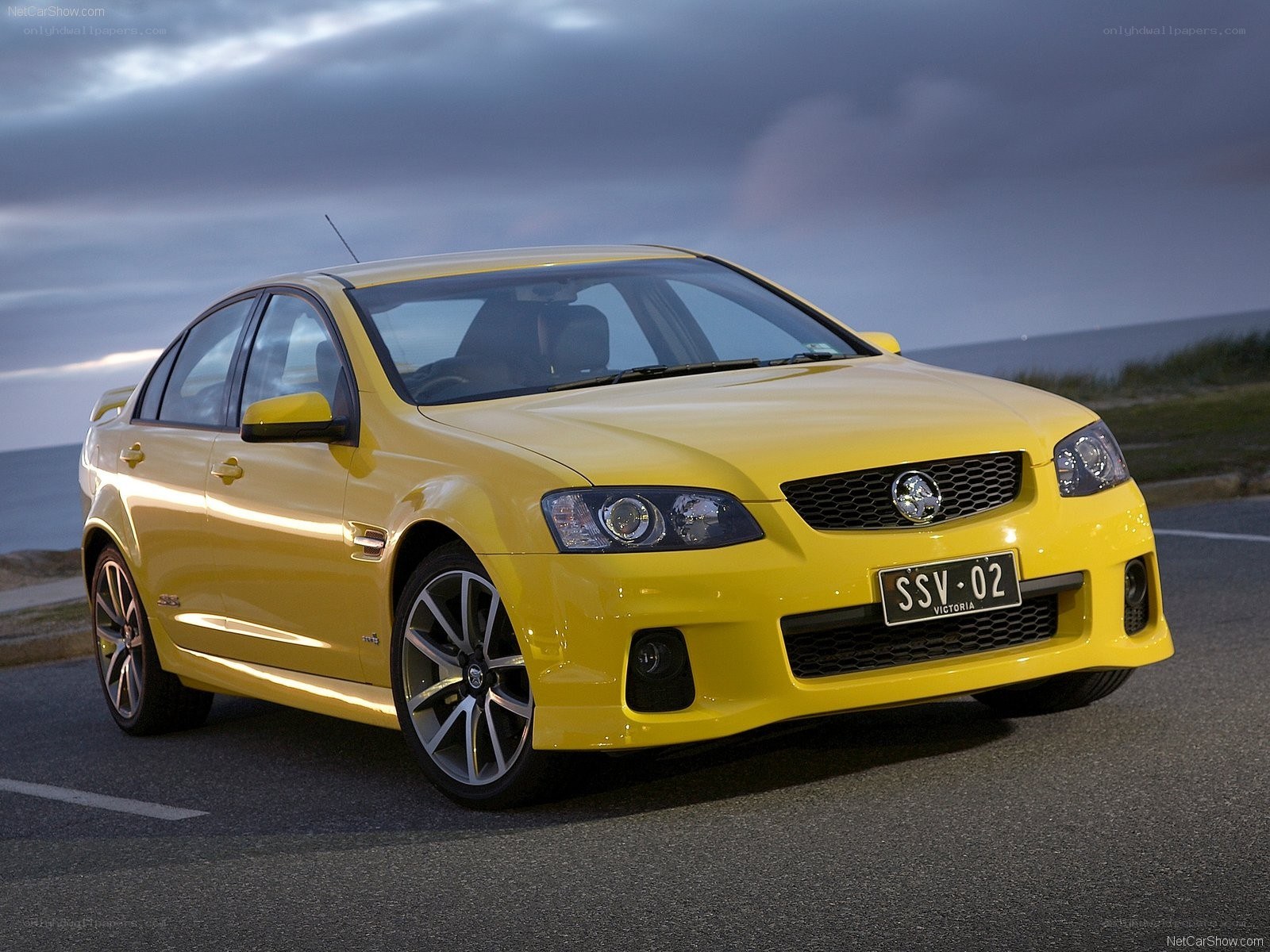 yellow Holden Commodore sedan