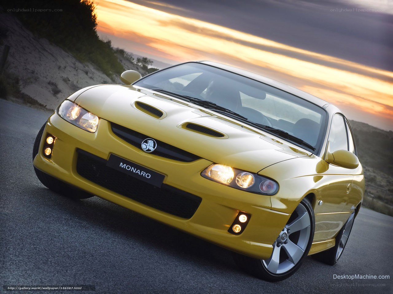 Yellow Holden Monaro at sunset