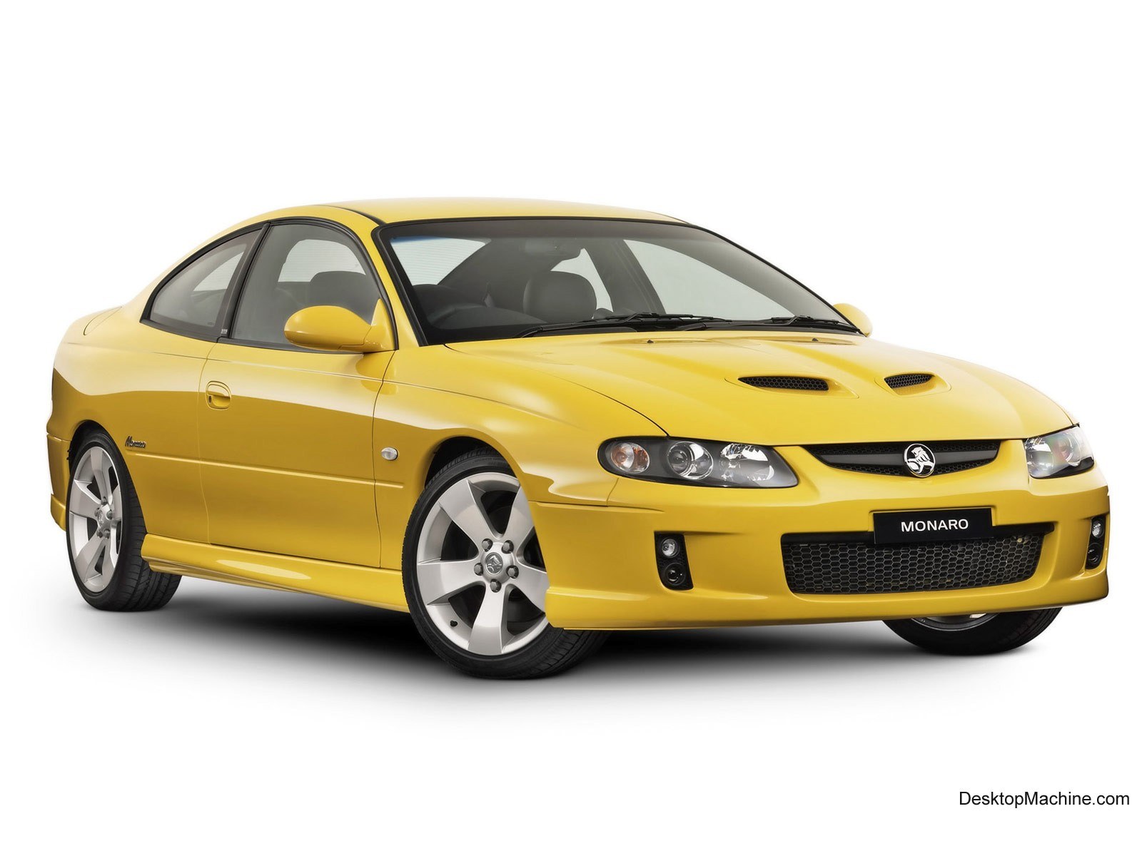 yellow Holden Monaro coupe