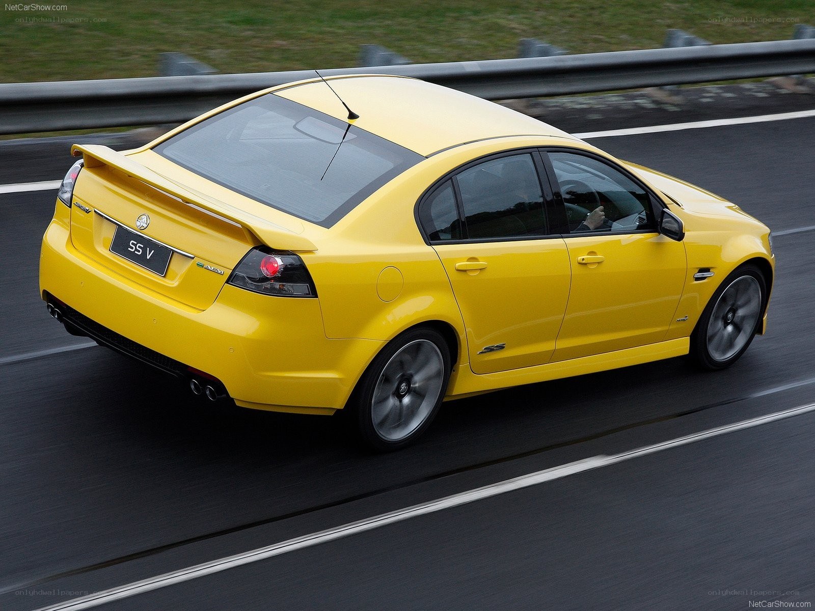 Yellow Holden SS V in motion