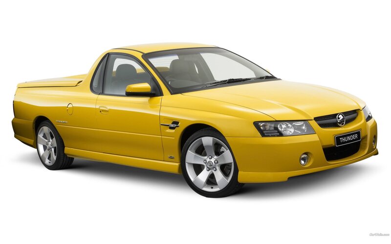 yellow Holden Thunder pickup truck