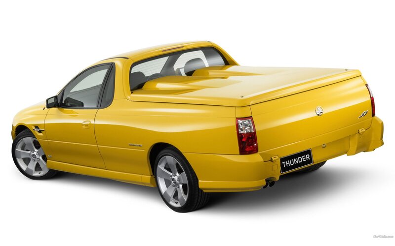 yellow Holden Thunder pickup truck