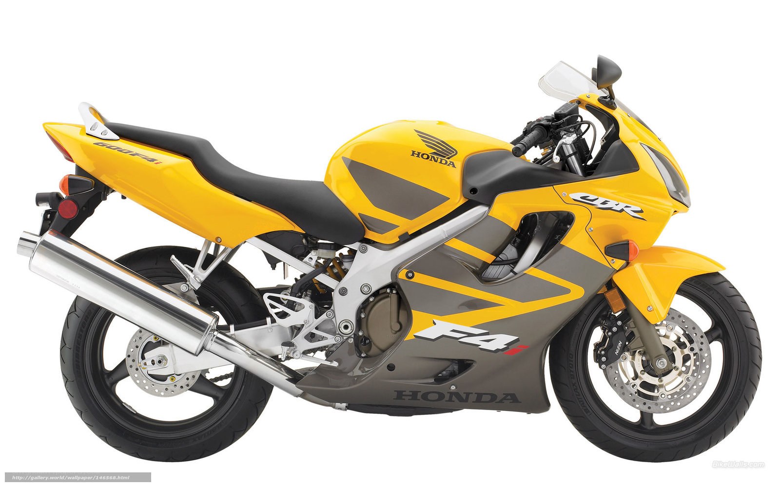 yellow honda cbr f4 motorcycle