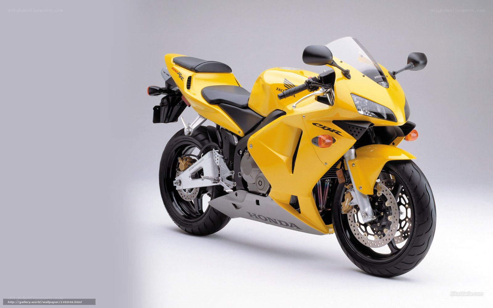 yellow honda cbr600rr motorcycle