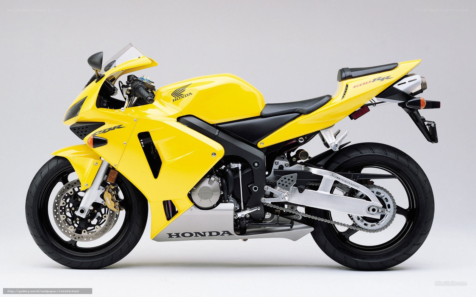 yellow honda cbr600rr motorcycle