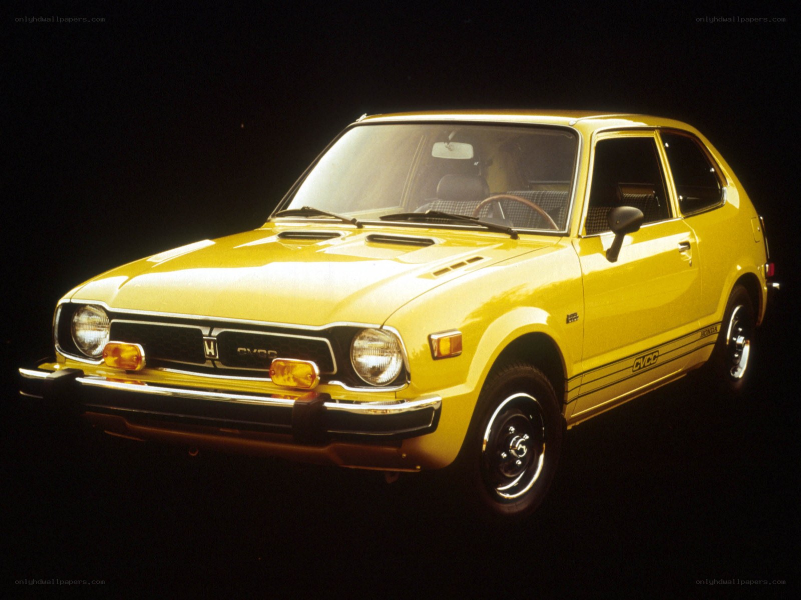 Yellow Honda Civic hatchback