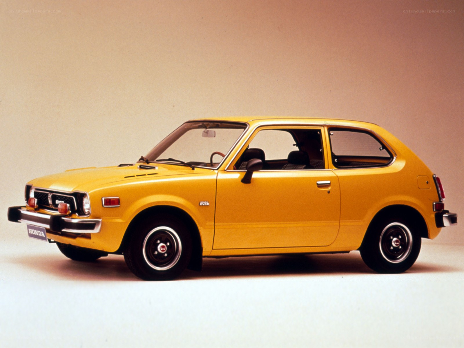 Yellow Honda Civic hatchback