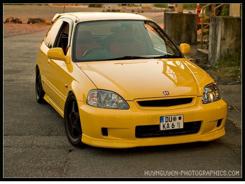 yellow honda civic hatchback