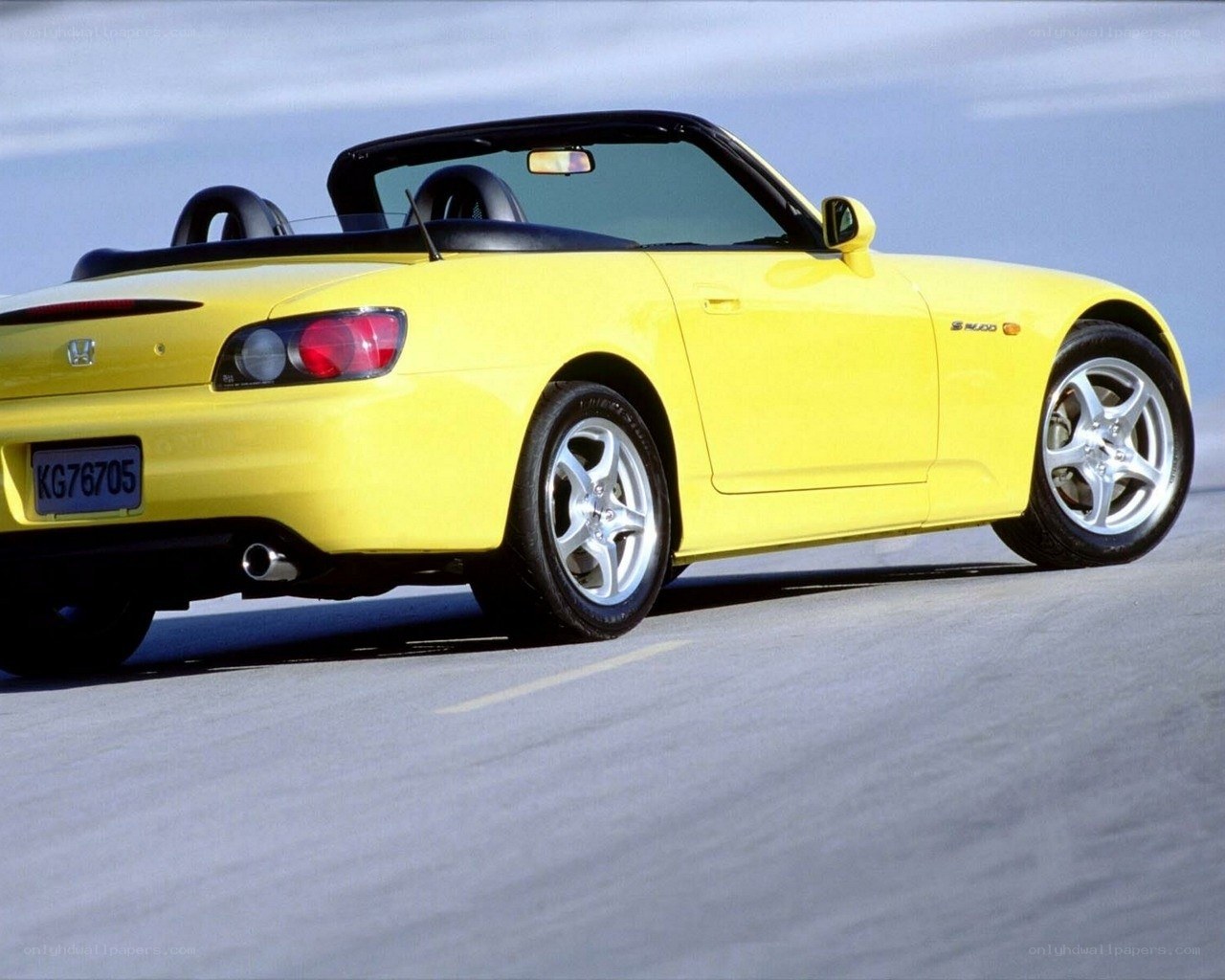 yellow Honda S2000 convertible