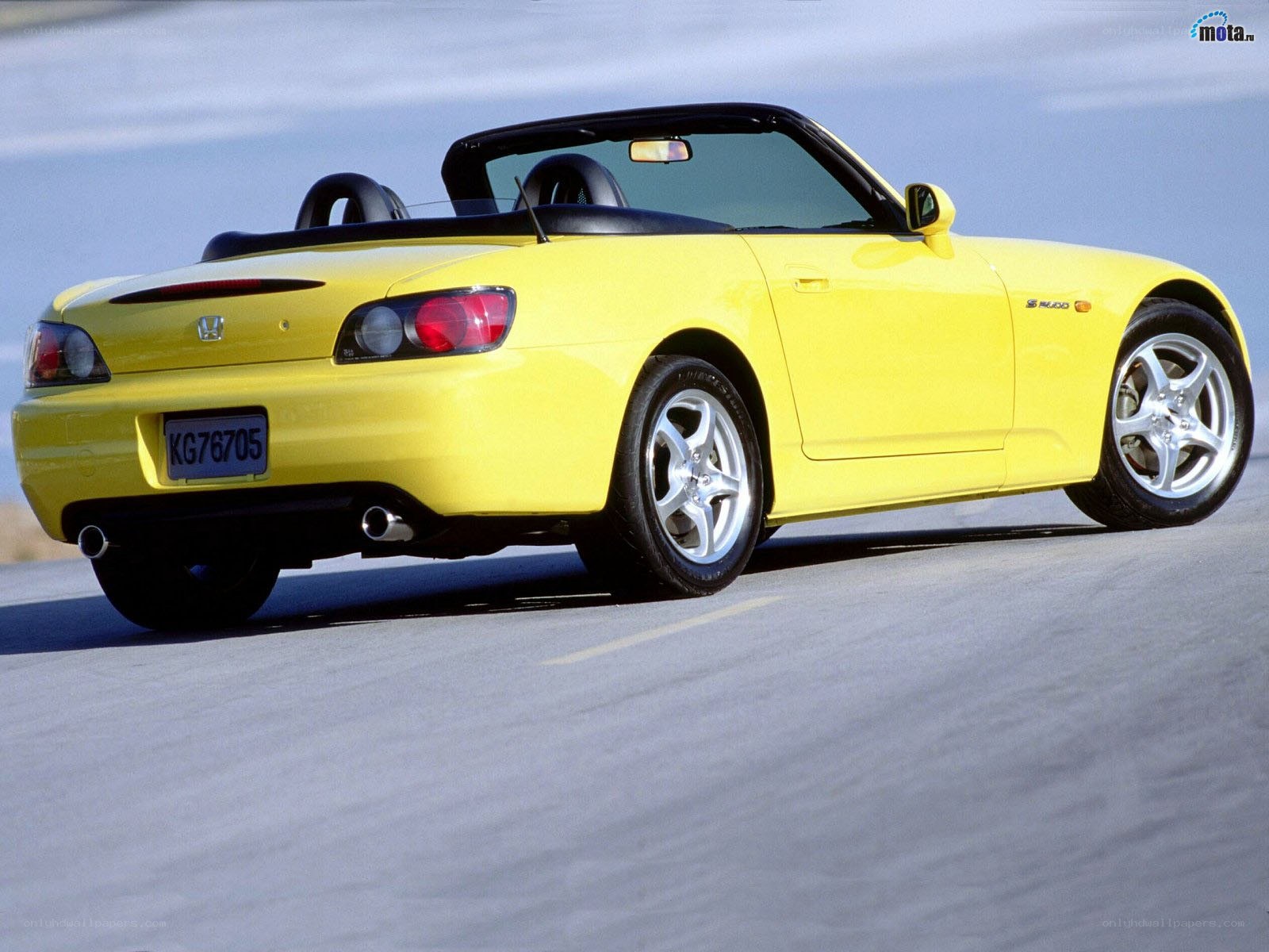 yellow honda s2000 convertible