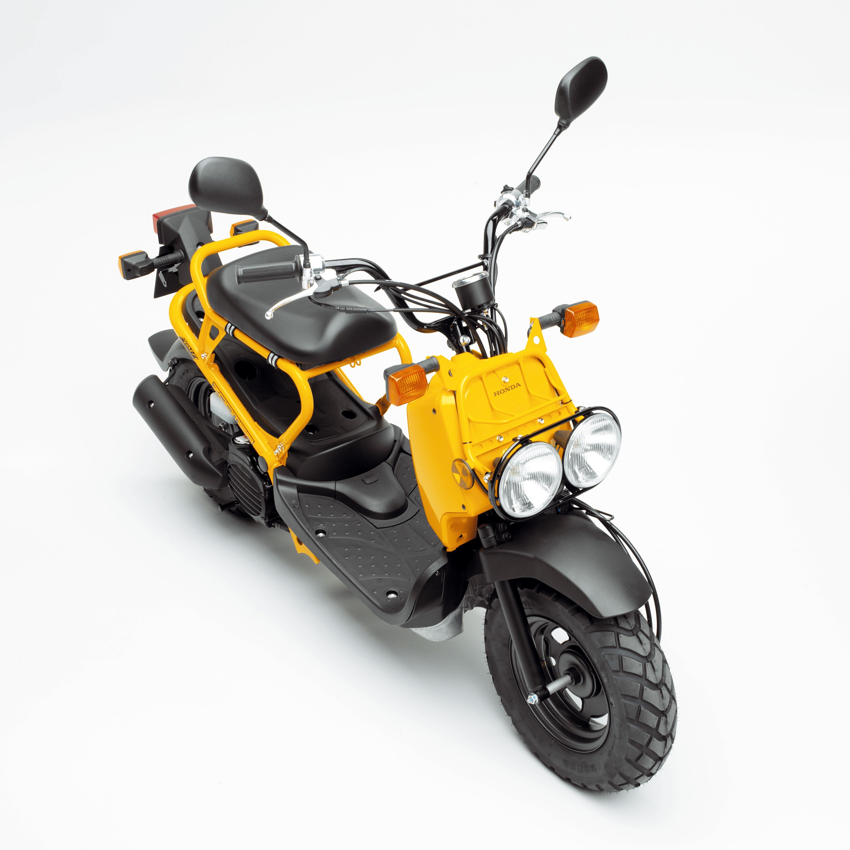 Yellow Honda scooter