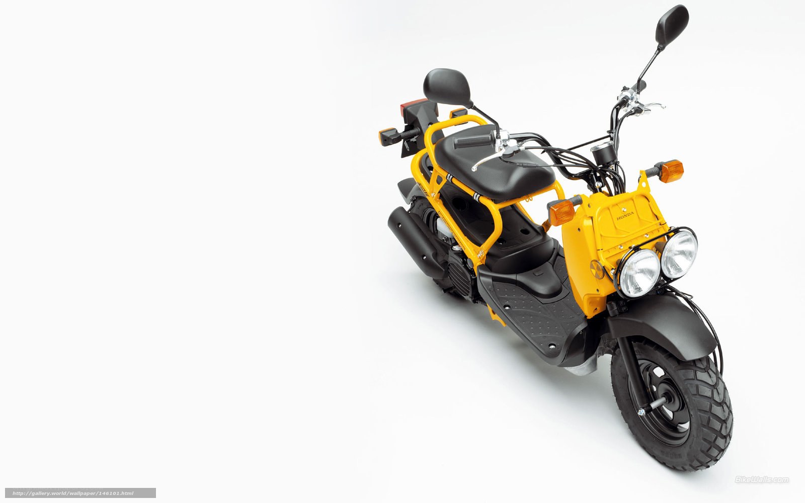 Yellow Honda scooter