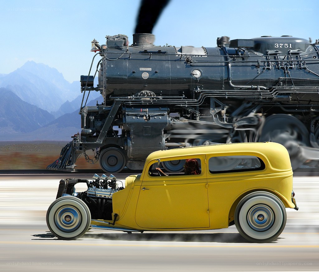 Yellow hot rod and steam train