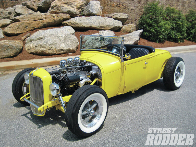 Yellow Hot Rod Car — Bright, Afternoon, Photograph, Rocks