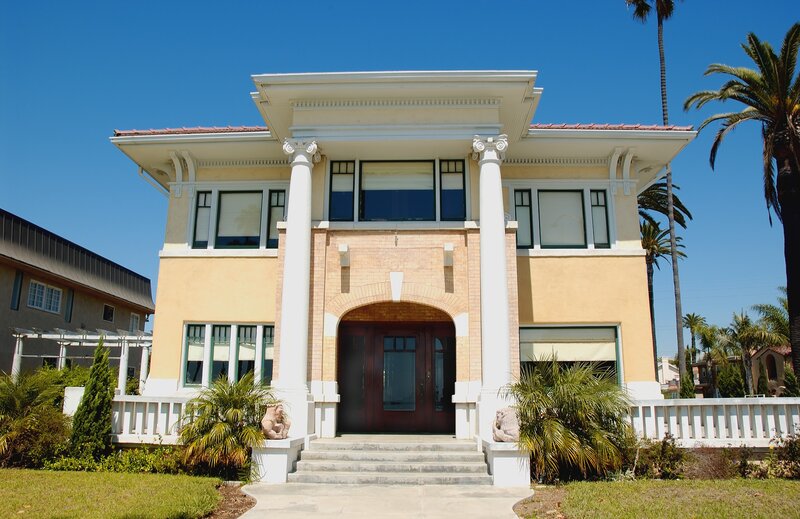yellow house with columns