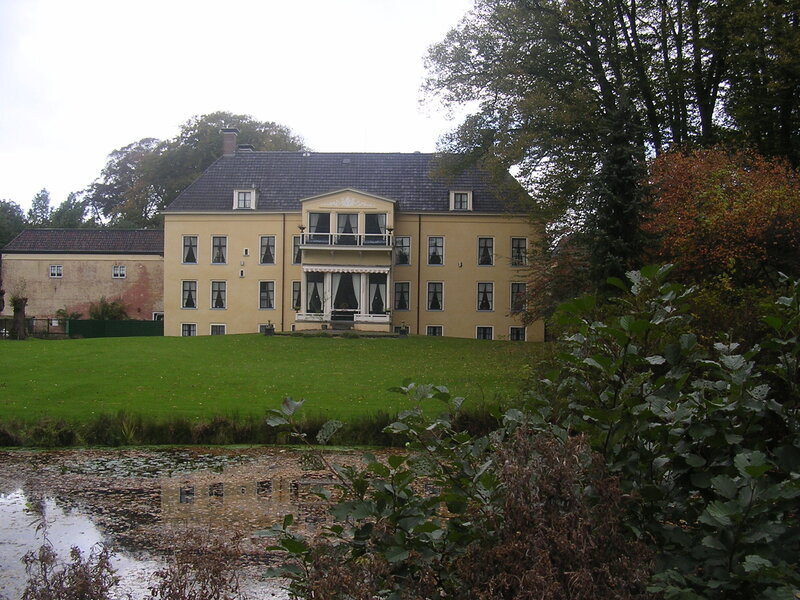 Yellow House with Pond