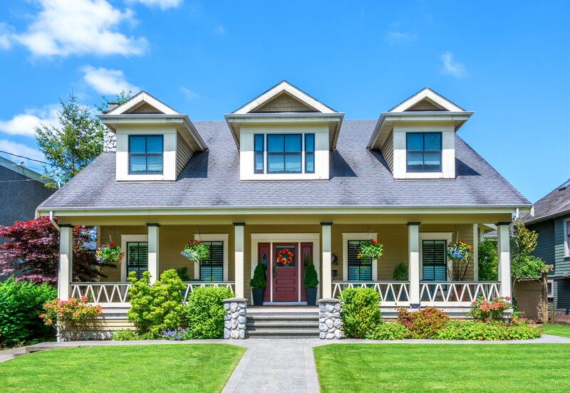 Yellow House with Porch — Green, Serene