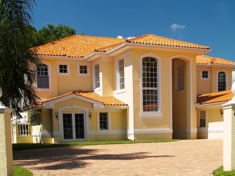 yellow house with tiled roof