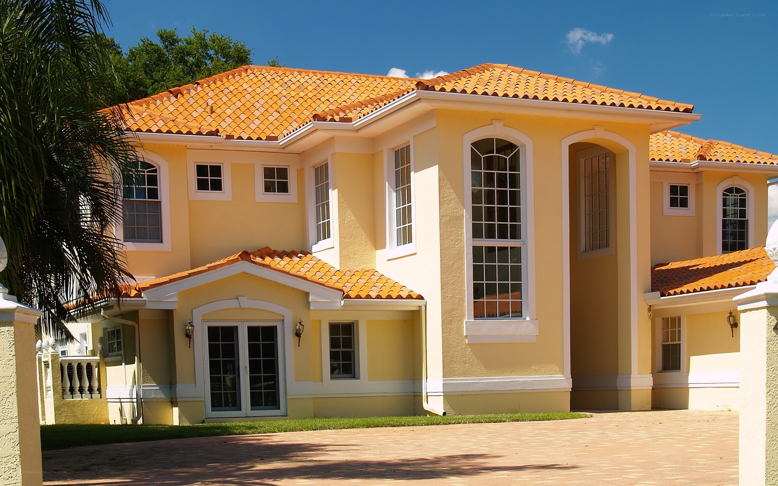 yellow house with tiled roof