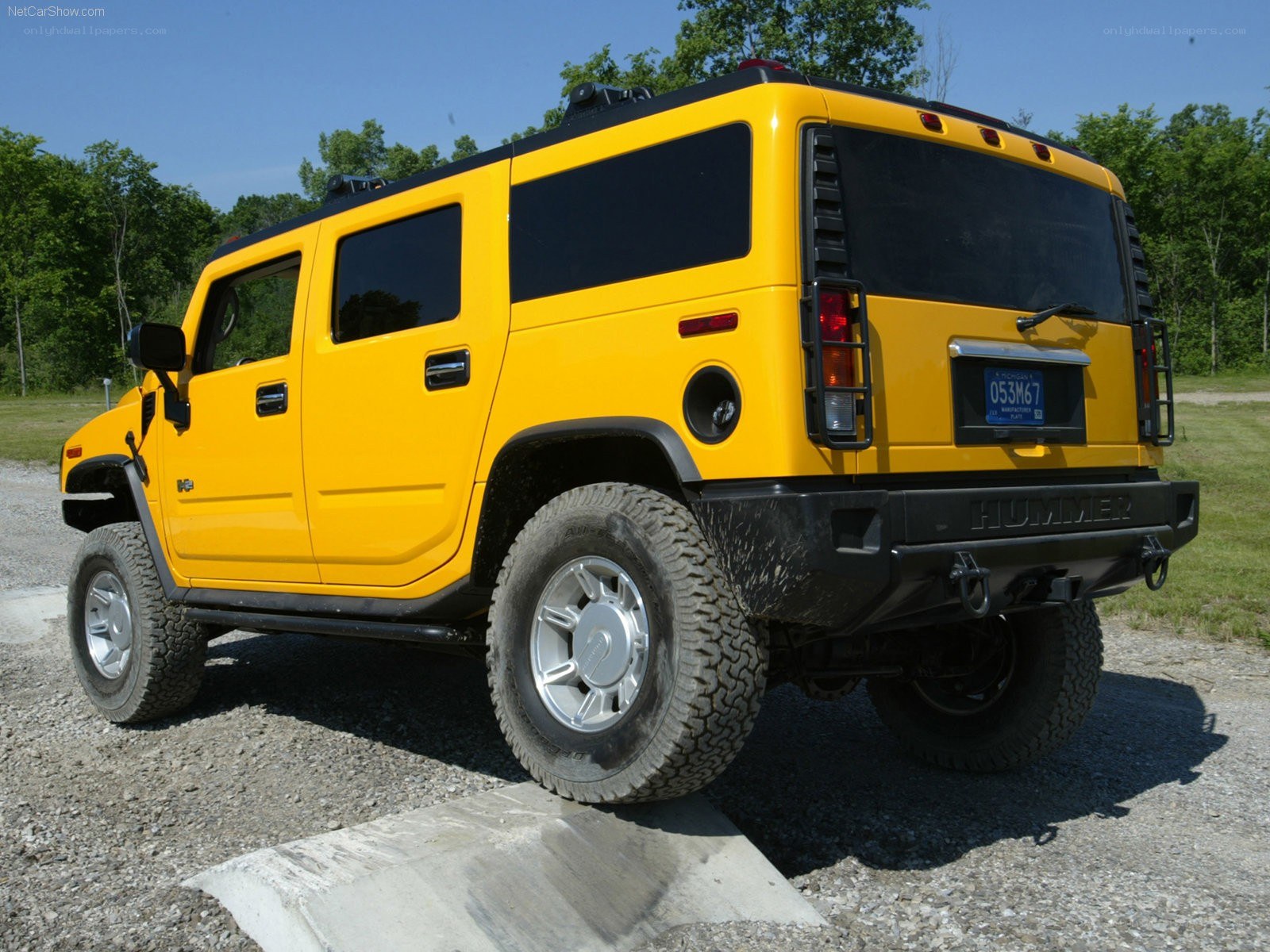 yellow hummer h2 suv