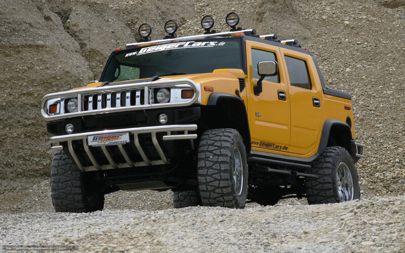 yellow hummer in rocky terrain
