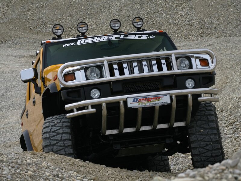 Yellow Hummer on gravel