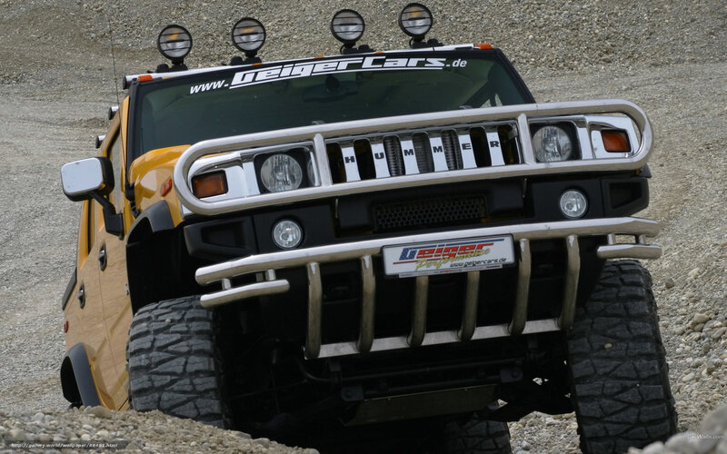 Yellow Hummer on gravel