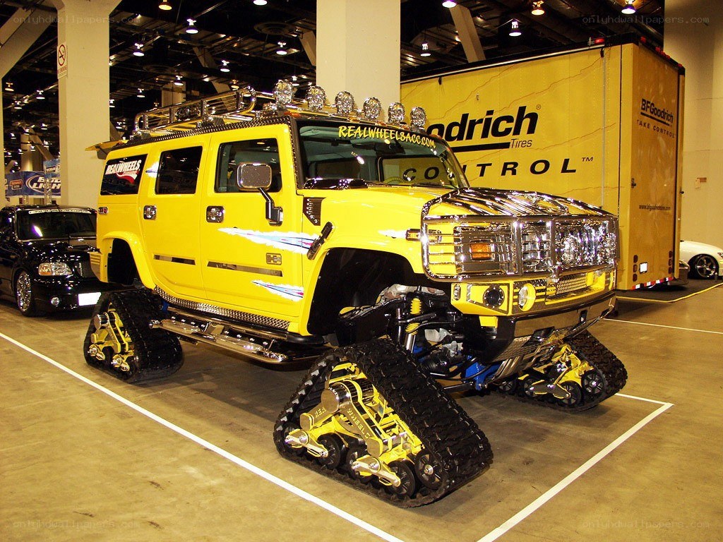 Yellow Hummer with tracks